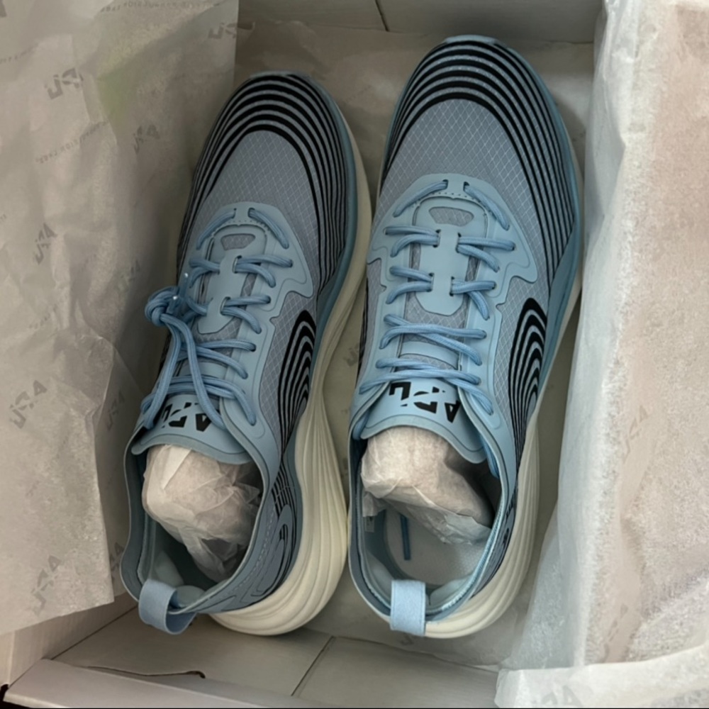 Brand new, never worn APL sneakers